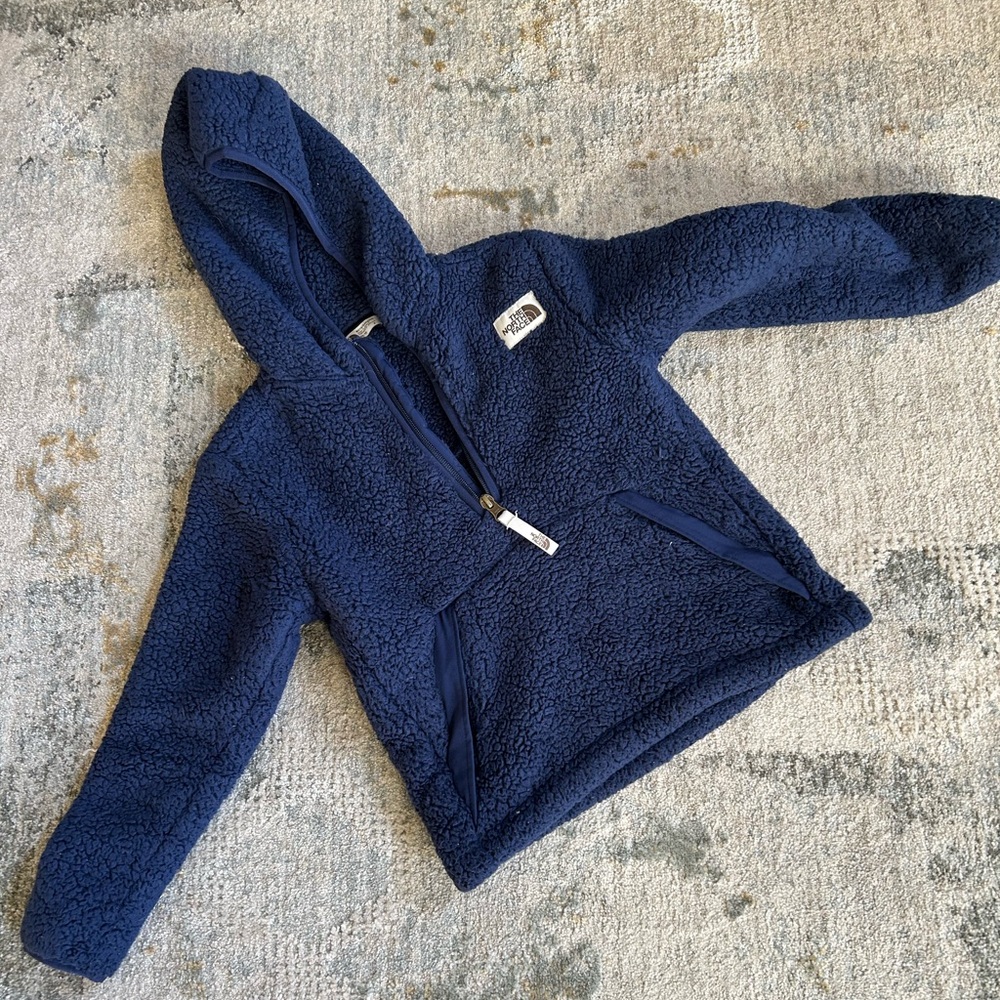 Boys Navy blue pullover jacket.